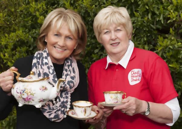 NI Chest Heart & Stroke Community Fundraising Co-ordinator Valerie Saunders (right) and NI Good Food Ambassador Jenny Bristow (left) have joined forces to raise awareness of heart attack symptoms and promote the charitys Ticker Tea Party fundraiser. Jenny is encouraging people throughout Ballymena to register at www.nichs.org.uk/TickerTea
Ticker Tea Parties can be organised on a date to suit you, anytime until World Heart Day which is on 29 September. (Submitted Picture).
