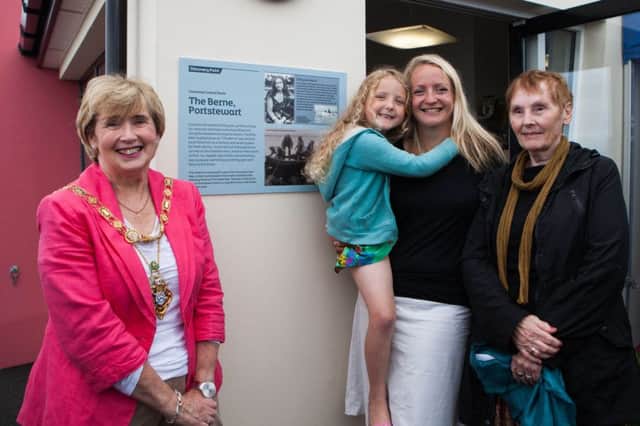 Mayor of Causeway Coast and Glens Borough Council, Alderman Maura Hickey unveiled a plaque at Paperfig Cafe in Portstewart on Tuesday morning, marking the swim from Donegal by Mercedes Gleitze in August 1929. Heather Clatworthy, (pictured centre with her daughter, Lilly) is due to make the same swim from Moville on Wednesday 27th July. Included is Mercedes daughter, Dolaranda Pember who unveiled the new panel with the mayor.