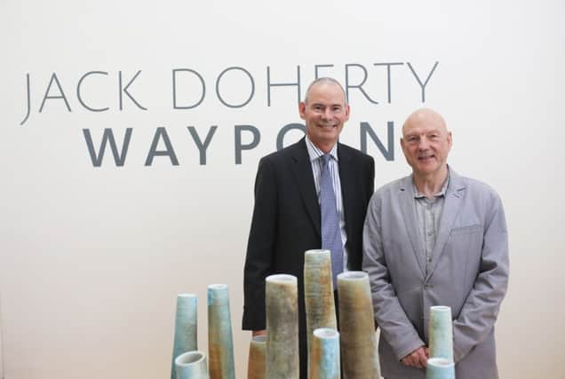 Craft NI Chief Executive Alan Kane from Coleraine and world renowned ceramic artist Jack Doherty from Portrush launch the tenth August Craft Month with Dohertys exhibition Waypoint at the Market Place Theatre in Armagh in conjunction with the John Hewitt International Summer School.