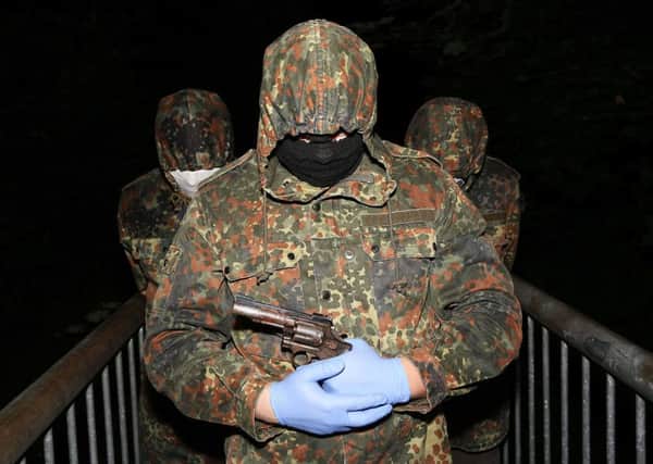 A masked and armed member of the republican dissident group Ã“glaigh na hÃ‰ireann in Park last week. A man has been arrested in Feeny in relation to violent dissident republican activity.
