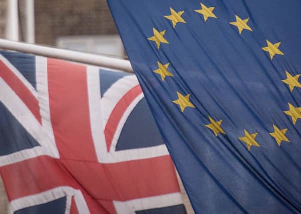 File photo dated 17/2/2016 of EU and UK flags fly above the EU Commission offices in Westminster, London, as Britain will open the doors to high levels of murderers, terrorists and kidnappers from countries like Turkey if it remains in the European Union, Leave campaigners have claimed. PRESS ASSOCIATION Photo. Issue date: Sunday May 22, 2016. Turkish membership will also put the NHS under huge strain, costing maternity services nearly £400m in 10 years, armed forces minister Penny Mordaunt warned. See PA story POLITICS EU. Photo credit should read: Stefan Rousseau/PA Wire