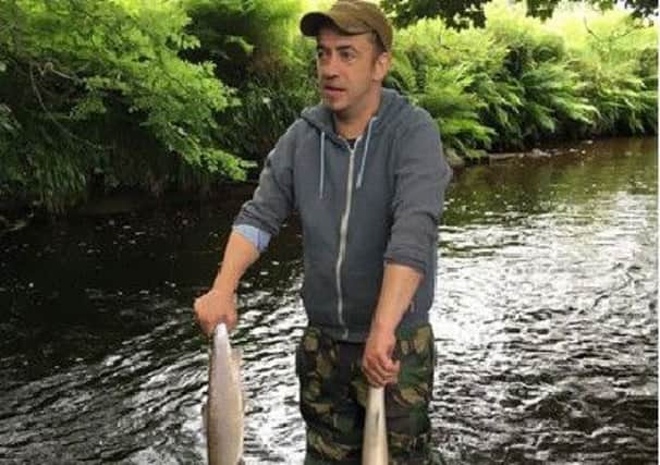 Dead fish are removed from the River Faughan following an unexplained fish kill.