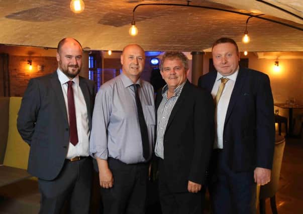 Kieran Quinn, Kevin Quinn and Phelim Devlin pictured with Adrian Logan at the official opening of Cuffs Bar & Grill at Crumlin Road Gaol. Picture by Darren Kidd / Press Eye. INTT 32-16 cuffs