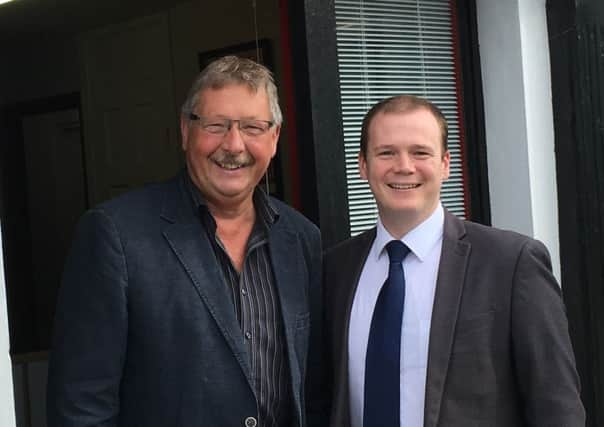 Sammy Wilson MP and Gordon Lyons MLA outside the new office.  INCT 32-722-CON