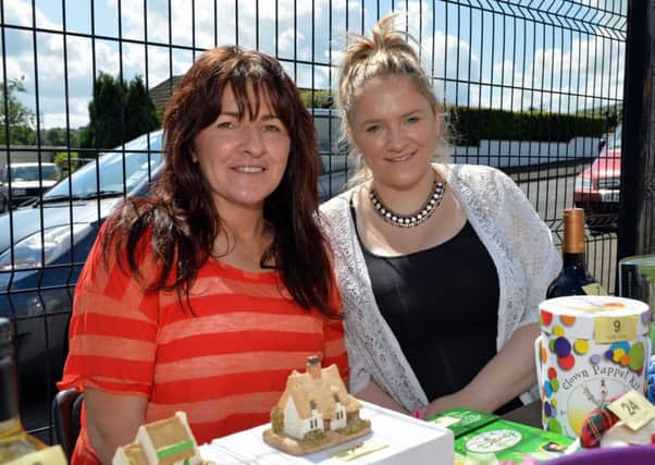 Janice and Joanna Wharry man the tombola stall at St Johns Masonic Centre summer fete in 2014. INLT 34-014-PSB