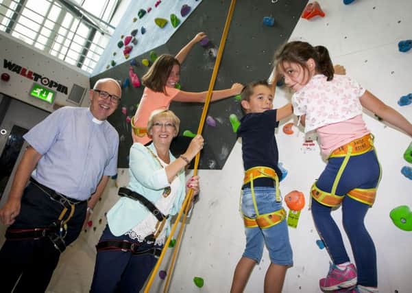 FUN DAY LAUNCH. . . . .The Mayor of Derry City and Strabane District Council, Alderman Hilary McClintock pictured with her grandchildren Charlie (10), Ben (8) and Caitlin (6) and Rev. Rob Craig (Tear Fund), one of her main charities this year, at the Climbing Wall in Foyle Arena on Tuesday afternoon for the launch of her Mayor's Annual Fun Day which will be held on Friday, 12th August at the Arena from 12.00 noon until 4.00pm.