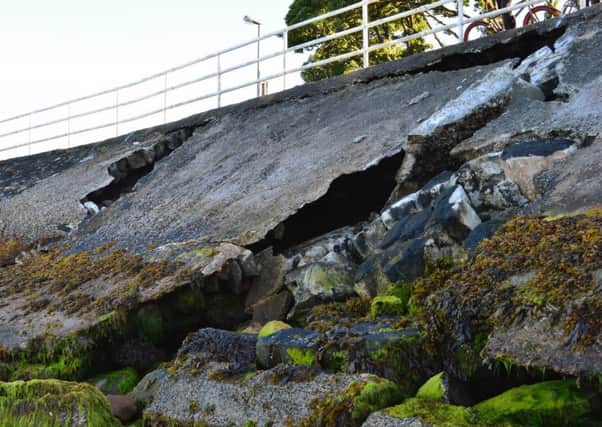 The two large holes at Larne promenade. Photo by Damian Jay Hemy. INLT-32-710-con