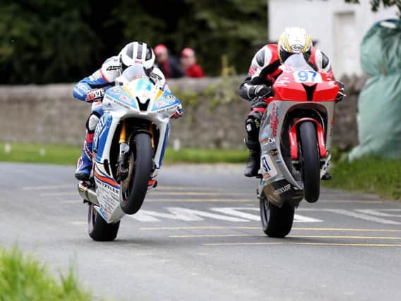 William Dunlop and Seamus Elliott in action at last year's Killalane Road Races.