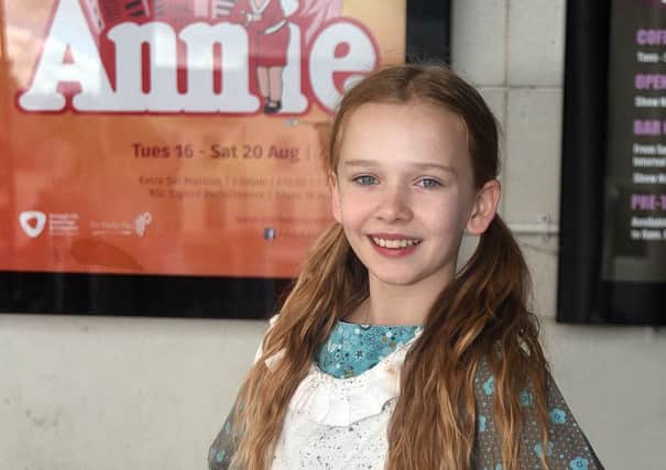 Laura Patton (11) from Lurgan who is playing Orphan Kate in the musical, 'Annie' at the Marketplace Theatre, Armagh. INPT32-204.