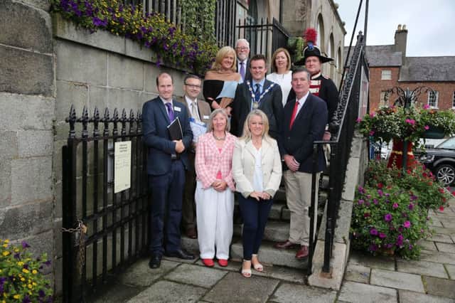Pictured with the Britain in Bloom judges as they walked around Hillsborough village assessing it for this year's Britain in Bloom final are: members of the Hillsborough community; Deputy Mayor, Alderman Stephen Martin; Councillor James Baird, Chairman of the Council's Environmental Services Committee; Heather Moore, Director of Environmental Services; Dr Theresa Donaldson, Chief Executive and a Hillsborough Old Guard.