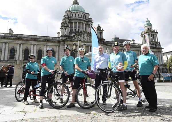 David Mann (third from left), member of Lisburn Tandem Group and current Chair of the Royal National Institute of Blind People in Northern (RNIB NI) joined other well-wishers including David Galloway, Director RNIB NI and Sammy Douglas MLA, at City Hall Belfast on Monday to support Ken Reid (second from right) on the Northern Ireland leg of his Cycle 750 UK wide challenge in aid of RNIB Talking Books. Picture: Michael Cooper