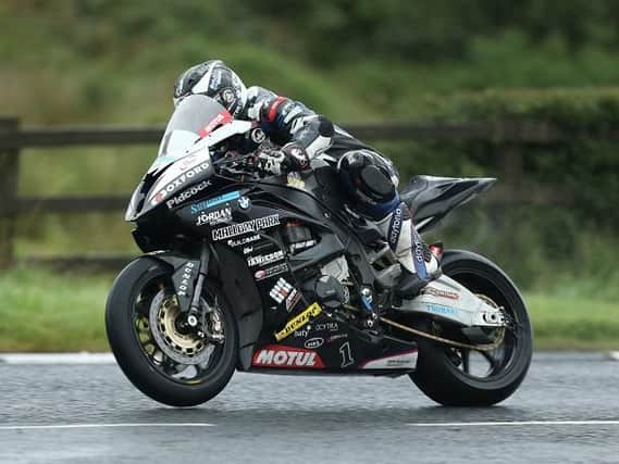 Michael Dunlop claimed pole position for the Superstock race at the MCE Ulster Grand Prix.