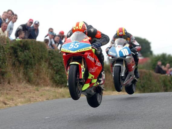 Darran Lindsay in action at the Kells Road Races in 2006 with Raymond Porter in close contention.