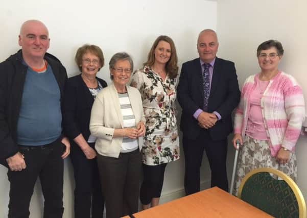 South Antrim MLA Trevor Clarke (second from right) with Dementia NI officers and group members. INNT 33-510CON