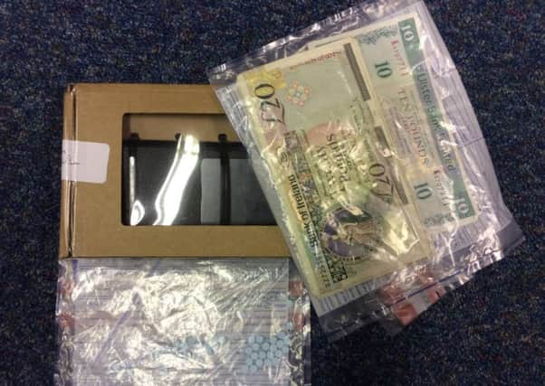 Drugs phone and cash seized by police