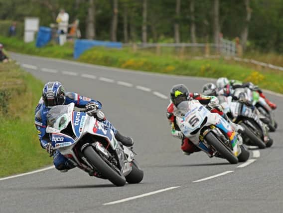 Ian Hutchinson leads Bruce Anstey, Michael Dunlop and Peter Hickman in the feature Superbike race at the MCE Ulster Grand Prix.