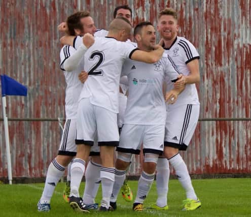 Rathfriland Rangers celebrate their late equaliser in the 2-2 draw with Ards Rangers on the opening day of the season. Pic: Rathfriland FC