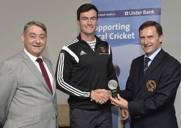 Lisburn cricketer Nathan Waller receives a prestigious Ulster Bank Award for his brilliant 111 against Waringstown in July.  The awards go to players who score a century, take at least six wickets or perform a hat-trick in the four sections of the Ulster Bank Senior League. Nathan received his award from Ulster Bank Executive David Ward and the President of the Northern Cricket Union, Peter McMorran.Pic by Rowland White/PressEye