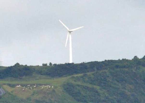 Wind turbine at Glenarm Head (file photo). INLT 27-006-PSB