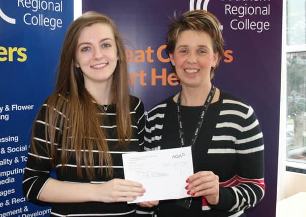 Richhill Student Natalie Crozier who achieved an A*, A  and B with pychology lecturer Susanna Hyde. INPT34-010
