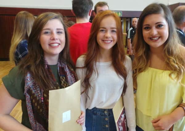 Abbie, Kiera and Jodie celebrate their A Level results at Larne Grammar School.  INLT 33-650-CON