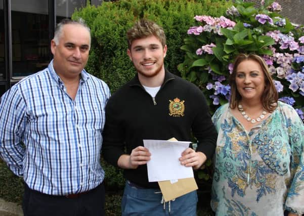 Wallace High School pupil Toby Kerr pictured at the school after receiving his A Level results today.