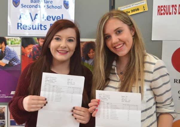 Cloe Hamilton (A*,B,B) and Megan McNeilly (A*,A,B) pick up their A Level results at Ballyclare Secondary School. INNT 34-513CON
