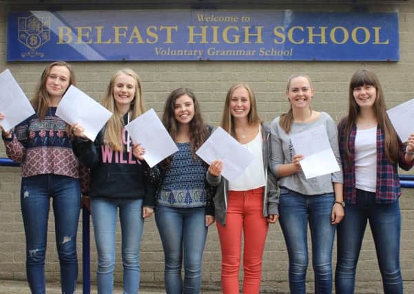 Belfast High School A Level students celebrate their great grades. INNT 34-518CON
