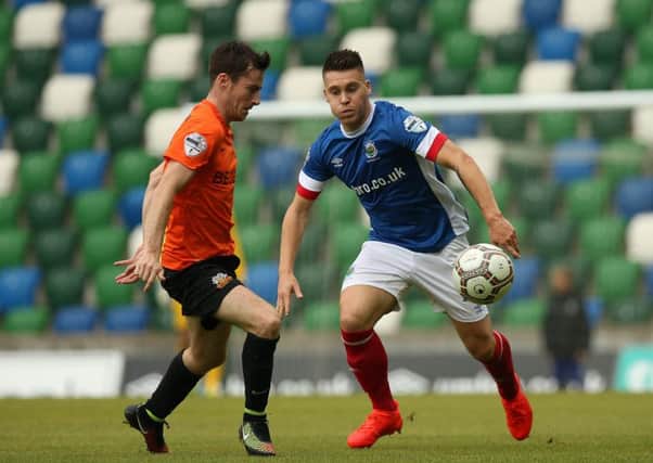 Linfield's Josh Carson  and Glenavon's Andy McGrory