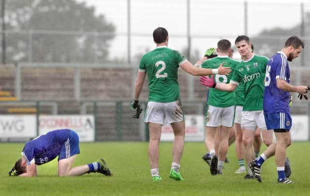 Despair for Claudy on the final whistle after being beaten by Newbridge during the Derry SFC at Owenbeg on Saturday. (Picture: Margaret McLaughlin)
