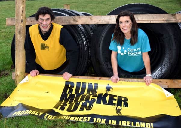 Melvin Dewart launches Run Mucker Run with Emma McArdle of Cancer Focus. (Submitted Picture)