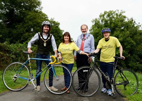 The Lord Mayor of Armagh City, Banbridge and Craigavon Borough Council, Councillor Garath Keating (left) and Deputy Chairperson of Newry, Mourne and Down District Council, Councillor Garth Craig (3 rd from left) are joined by Claire Hogarth, Friends of the Cancer Centres fundraising manager and charity supporter, Peter Clarke, to call on local people to put their pedal power to the test and join Friends of the Cancer Centres first ever Newry Canal Cycle on Saturday, 24 th September.