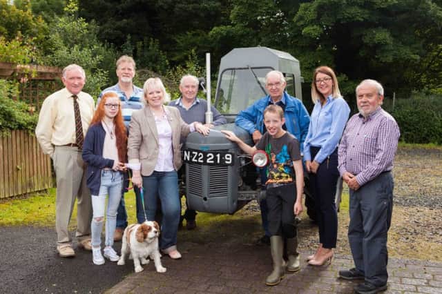 Launching the Garvagh Show recently was (from left to right) Nevin Smith, Chairman of the Garvagh Clydesdale and Vintage Vehicle Club, Derek Knight, Hugh Boreland, Jessica Jane McQuillan, Michelle Knight-McQuillan, Secretary of the Garvagh Clydesdale and Vintage Vehicle Club, Honey the dog, who may enter the annual pet show, Andy Moore, Pamela Jordan, Business Development Manager of RiverRidge Recycling, Raymond Boyce and Jamie Higgins.