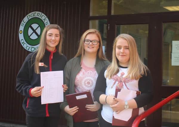 St Patrick's pupils Amie McMahon, Neve Gilmore and Karyn Keery celebrate their excellent results.