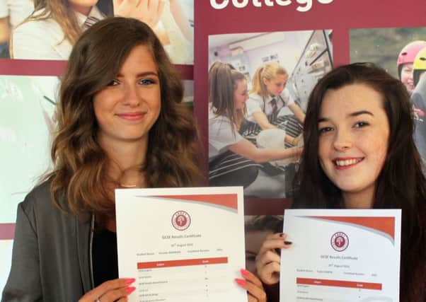 Pupils celebrate results at Abbey Community College. INNT 35-806CON