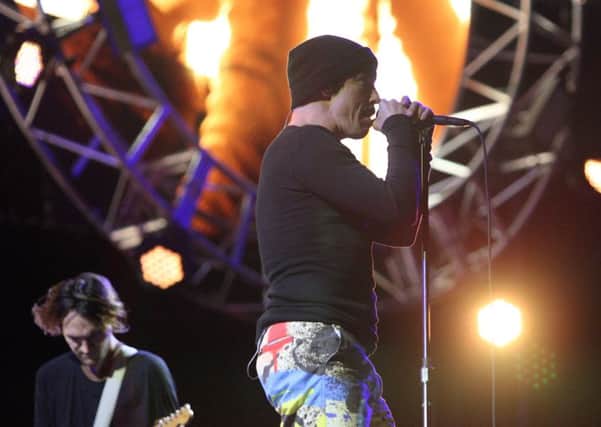 Red Hot Chili Peppers lead singer Anthony Kiedis and guitarist Josh Klinghoffer on stage at Tennent's Vital. Pic by Freddie Parkinson, PressEye