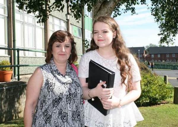 Kara Judge, one of the top performing GCSE students at Drumcree College, with mum Susan. INPT37-002