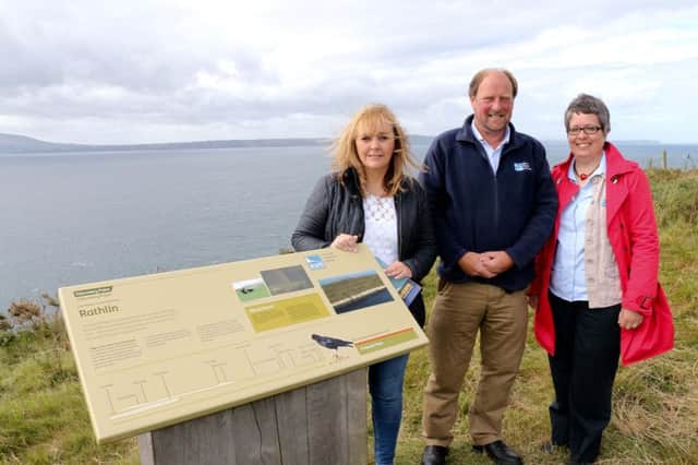 Rural Minister Michelle McIlveen (left) with Liam McFaul, RSPBNI local warden on Rathlin and Joanne Sherwood, director RSPBNI. INCR 37-701-CON