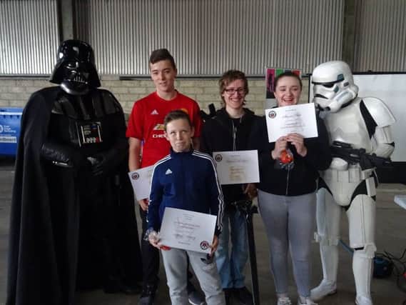 Phoenix Youths (Youth Forum) with visitors from 501st Brigade. Including Shania Platt (centre) with her Endeavour Award.