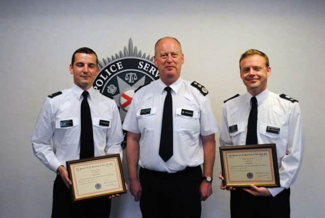 Chief Constable George Hamilton with Constable Richard Westbury (left) and Sergeant Scott Thompson.