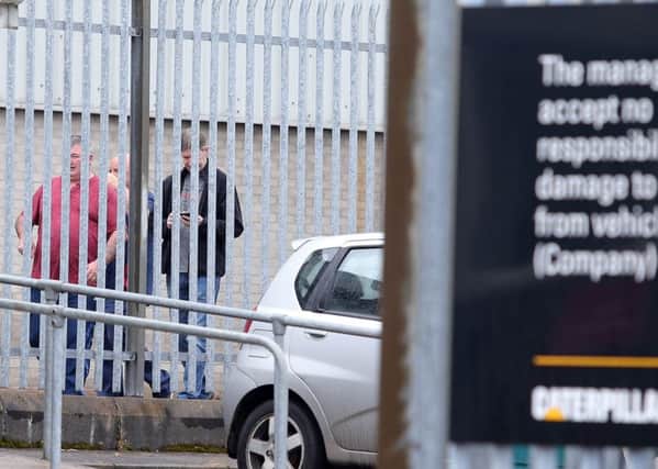 Press Eye Belfast - Northern Ireland 1st September 2016  

Workers leave the Caterpillar factory in Monkstown outside Belfast where staff were told the factory is to shut with the loss of 250 jobs.  Other such meetings were held at the companies other factories in west Belfast and Larne.  

Picture by Jonathan Porter/Press Eye