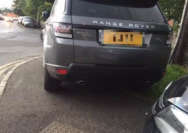 A car parked on the pavement at Taylor's Avenue (submitted picture).  INCT 36-721-CON