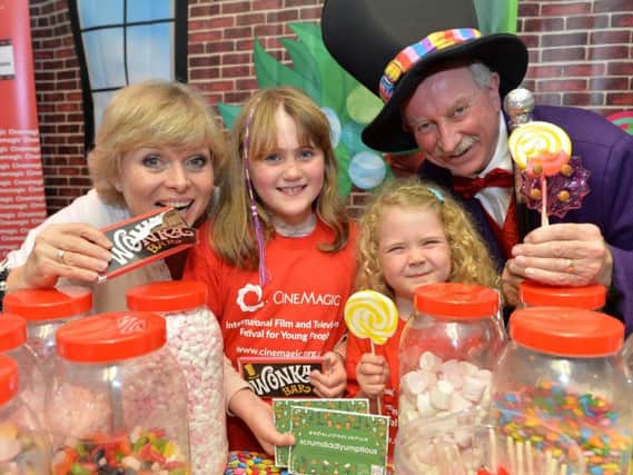 Ellie Gow (5) and her sister Grace (9) from Bangor had some competition for her chocolate with  Julie Dawn Cole aka Veruca Salt from the 1971 film Willy Wonka and The Chocolate Factory and Jim Moore from Aunt Sandras Candy Factory pictured at Cinemagic's Roald Dahl on Film afternoon.
Photo by Aaron McCracken/Harrisons