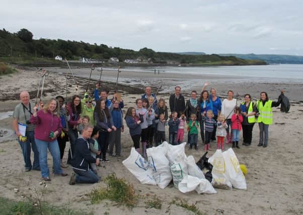 Volunteers pictured during last year's clean-up at Brown's Bay.  INCT 36-736-CON