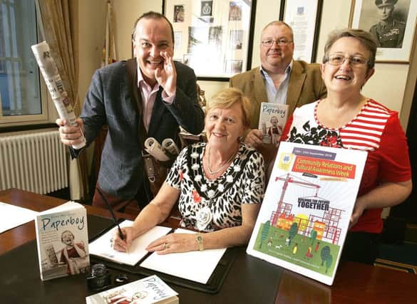 Writing Our Future Together: Mid & East Antrim Mayor Audrey Wales and bestselling author Tony Macaulay pictured with Councillors Stephen Nicholl and Beth Clyde at the launch of a local programme of events to mark Community Relations and Cultural Awareness Week, which runs from September 19-25.