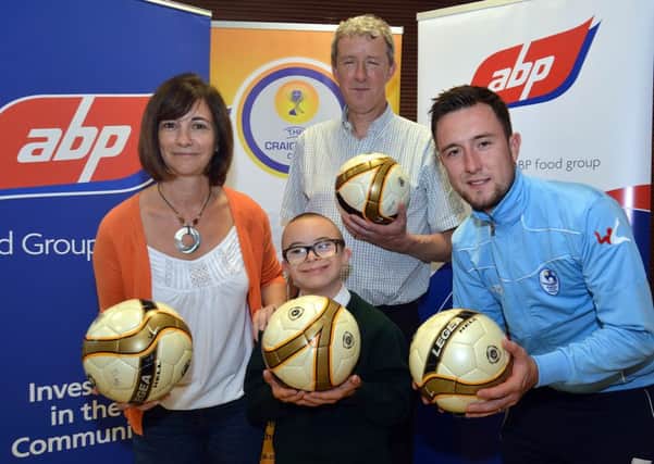 Pictured at the launch of the Craigavon Cup, football competition are from left, Sonia McCleary, HR manager ABP Meats, Jay Beattie, Seamus Kenny, general manager ABP Meats, competition sponsors and Thomas McStravick, Craigavon Cup co-ordinator. INLM37-201.