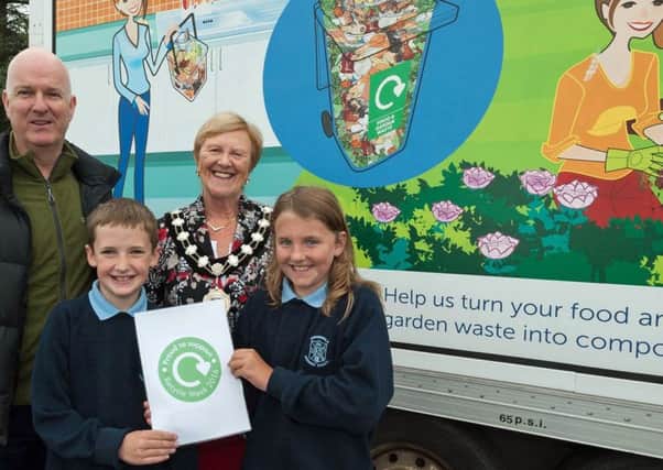 Kirkinriola PS  pupils Luke Millar of P6 and Naomi Turtle of P7, with Mid and East Antrim Mayor Audrey Wales MBE and Barry Tapster. (Submitted Picture).