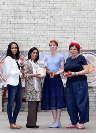 Pictured at the Conway Mill which has historic links with Belfasts industrial past, just as the former Mackies and Sirocco sites are: (left to right) Kanlini Chillara, Exhibition Artist, Nisha Tandon, Chief Executive ArtsEkta, Rachel Sayers, Project Manager, Sanskriti, and well known creative artist Rose Moore who helped to produce the wall hanging which forms a major part of the exhibition.