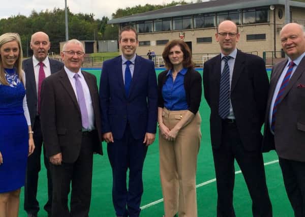 Minister Givan is pictured at Banbridge Hockey Club with (L-R): Carla Lockhart MLA; Cllr Junior McCrum; Sydney Anderson MLA; Sheree Totton; Neil Madeley  Banbridge Hockey  Club; David Simpson MP.
