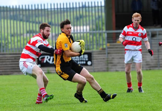 Justin McCafferty hit 0-2 as Pomeroy defeated Gortin in the Intermediate Championship.